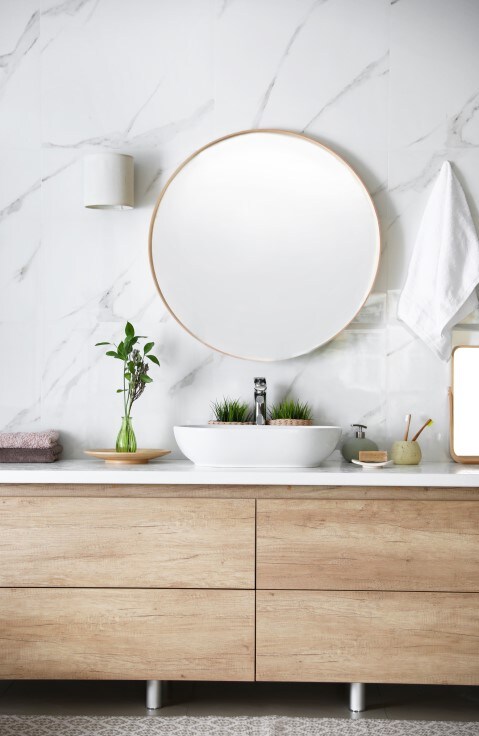 man brushing teeth in mirror with Colgate toothbrush man brushing teeth in mirror with Colgate toothbrush